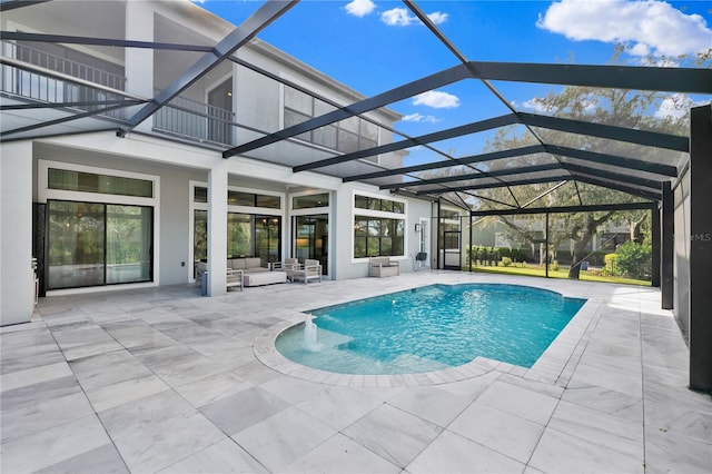 view of pool featuring an outdoor living space, glass enclosure, and a patio area