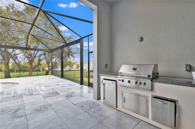 view of patio / terrace featuring a lanai and a grill