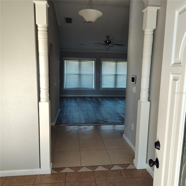 corridor with tile patterned flooring