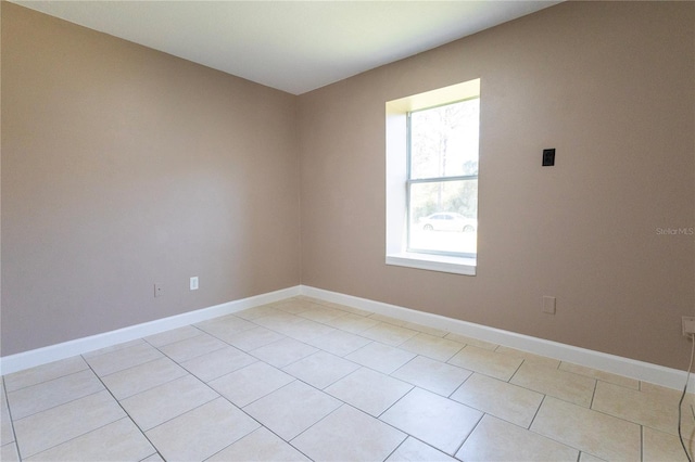 view of tiled spare room