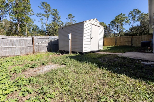 view of outdoor structure featuring central AC unit