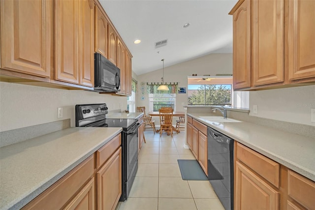 kitchen with sink, hanging light fixtures, vaulted ceiling, light tile patterned floors, and black appliances