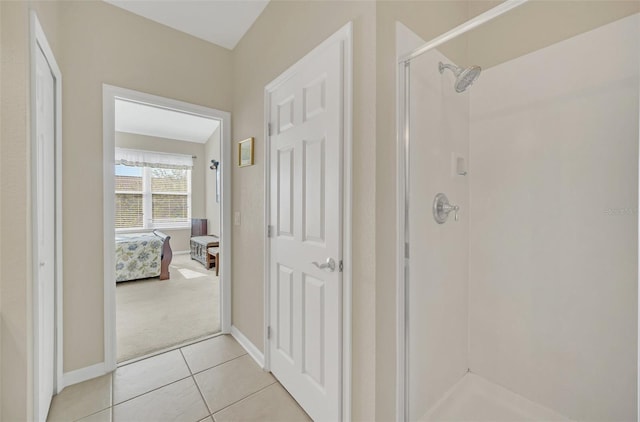 hallway featuring light tile patterned floors