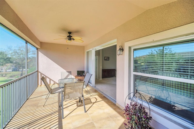 balcony featuring ceiling fan