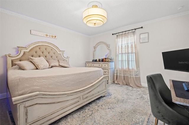 bedroom with crown molding