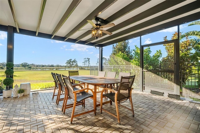 view of patio featuring ceiling fan