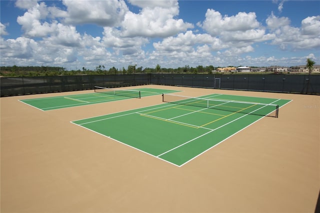 view of sport court with basketball hoop