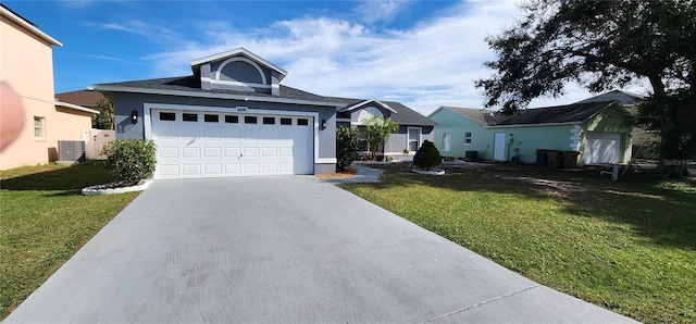 ranch-style home with cooling unit, a garage, and a front yard