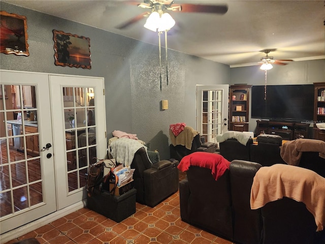 living room with french doors and ceiling fan