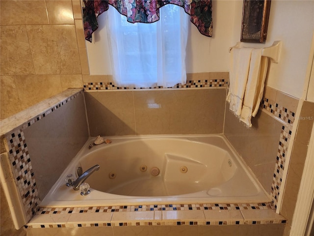 bathroom with tiled tub