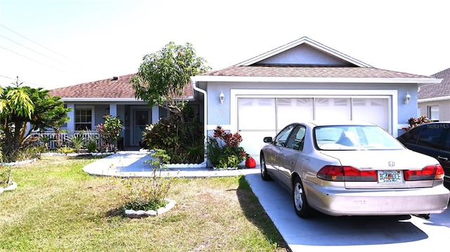 single story home with a garage, stucco siding, concrete driveway, and a front yard