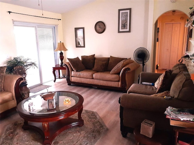 living room with light hardwood / wood-style flooring