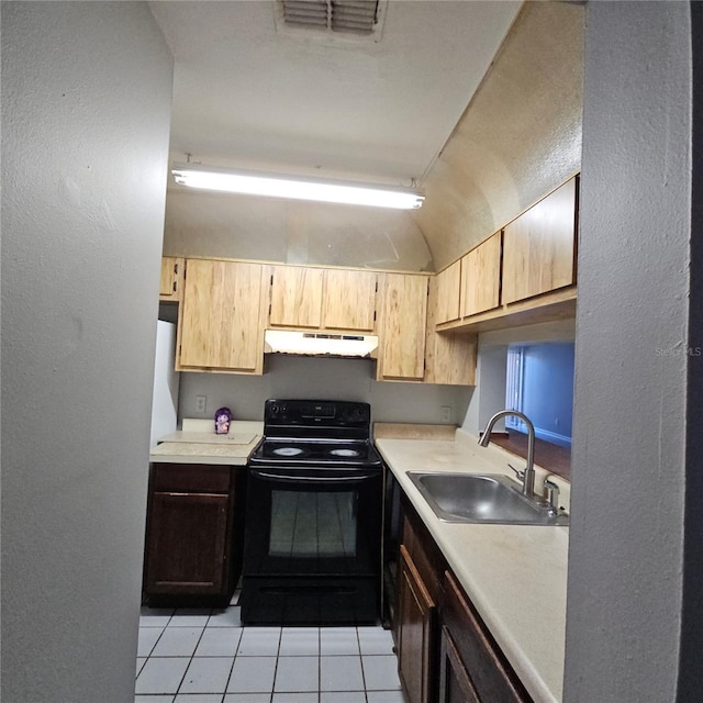 kitchen with light tile patterned floors, black / electric stove, and sink