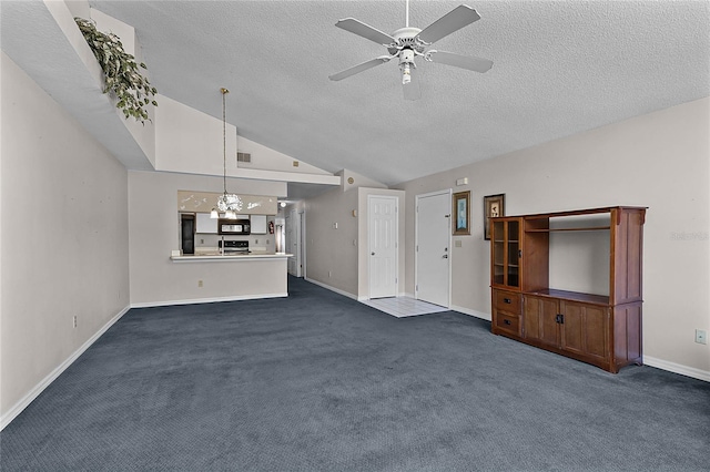 unfurnished living room with dark colored carpet, a textured ceiling, ceiling fan with notable chandelier, and high vaulted ceiling