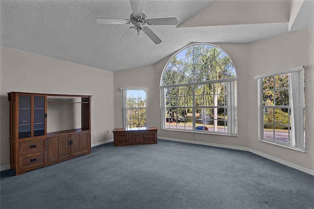 unfurnished living room with lofted ceiling, ceiling fan, carpet, and a textured ceiling