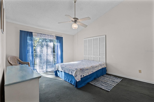 bedroom featuring a textured ceiling, ceiling fan, high vaulted ceiling, carpet floors, and a closet