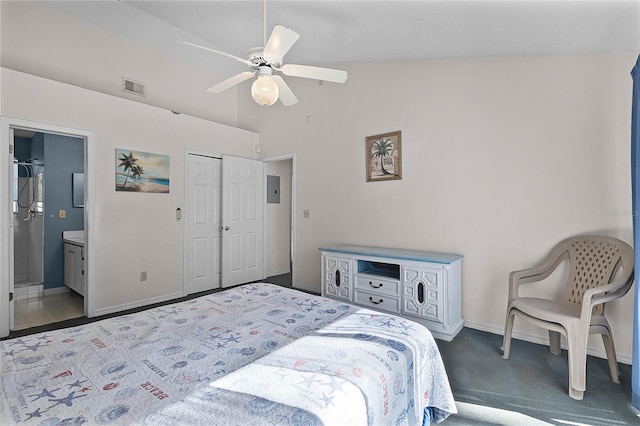 carpeted bedroom featuring ensuite bath, ceiling fan, electric panel, lofted ceiling, and a closet