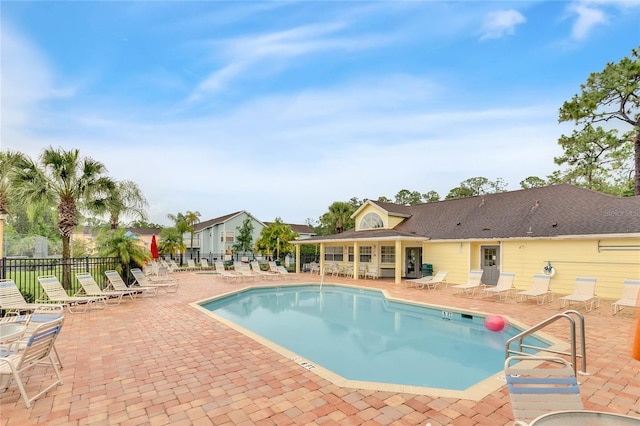 view of swimming pool with a patio area