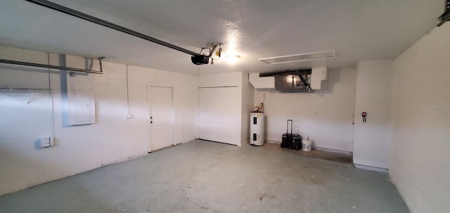 garage with a garage door opener and water heater