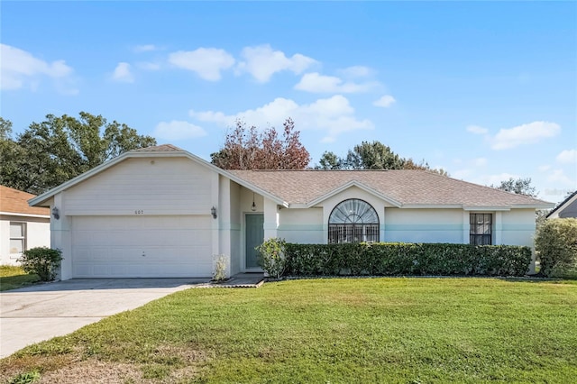 ranch-style house with a front yard and a garage