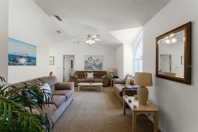 living room featuring a textured ceiling, ceiling fan, carpet floors, and lofted ceiling