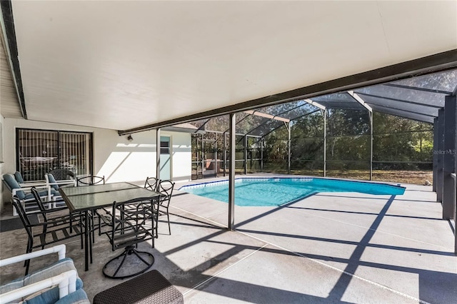 view of pool featuring a lanai and a patio