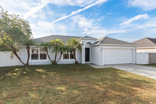 single story home with a garage and a front yard