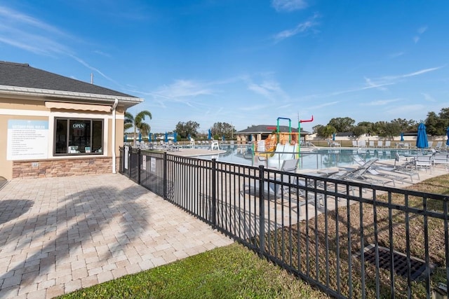 view of swimming pool featuring a patio