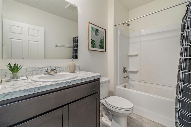 full bathroom featuring tile patterned floors, shower / bathtub combination with curtain, vanity, and toilet