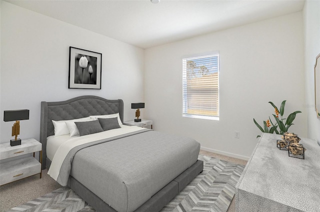 bedroom with light colored carpet