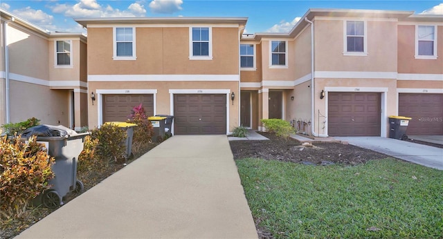 1336 Chelsea Dr, Davenport, FL 33897 - multi unit property with a garage, stucco siding, and driveway