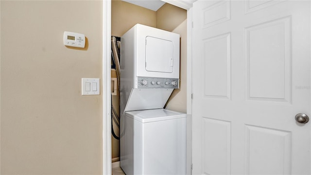 1336 Chelsea Dr, Davenport, FL 33897 - laundry room with stacked washing machine and dryer