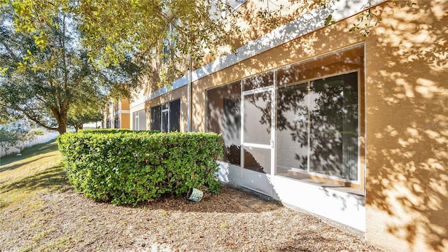 1336 Chelsea Dr, Davenport, FL 33897 - view of property exterior with stucco siding