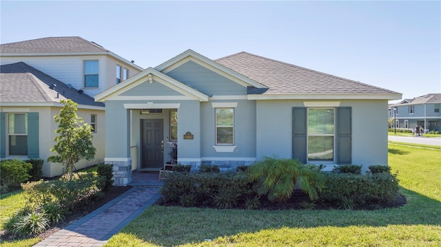 view of front facade with a front yard