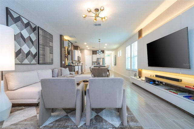 living room with a chandelier