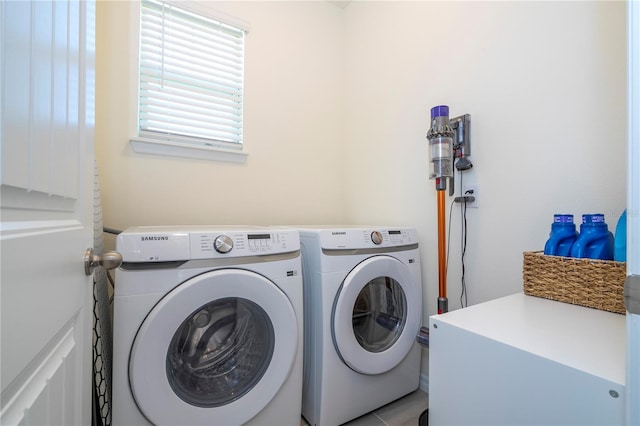 laundry room featuring washing machine and dryer