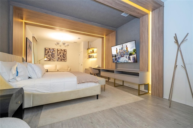 bedroom featuring wood-type flooring