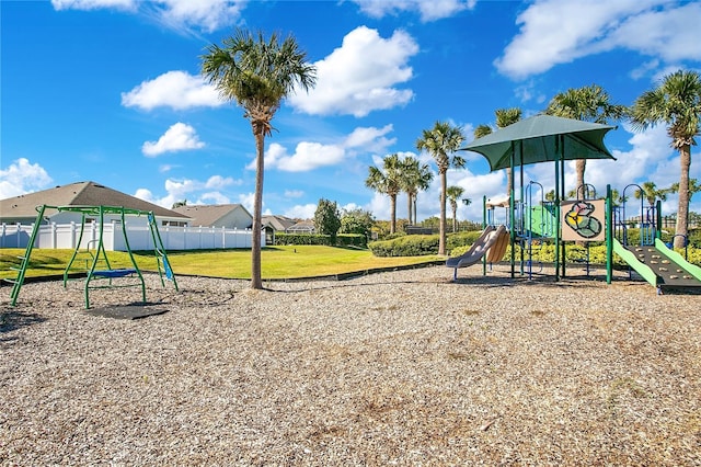 view of playground with a yard