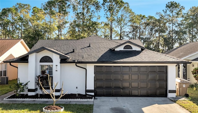 ranch-style home featuring a garage