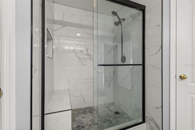 bathroom featuring an enclosed shower