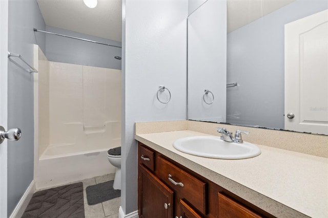 full bathroom with tile patterned floors, vanity, bathtub / shower combination, and toilet