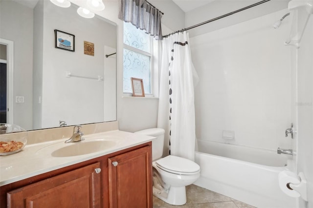 full bathroom with tile patterned floors, shower / bath combo with shower curtain, vanity, and toilet