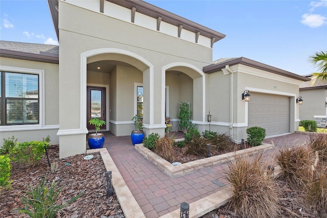 view of front of property with a garage