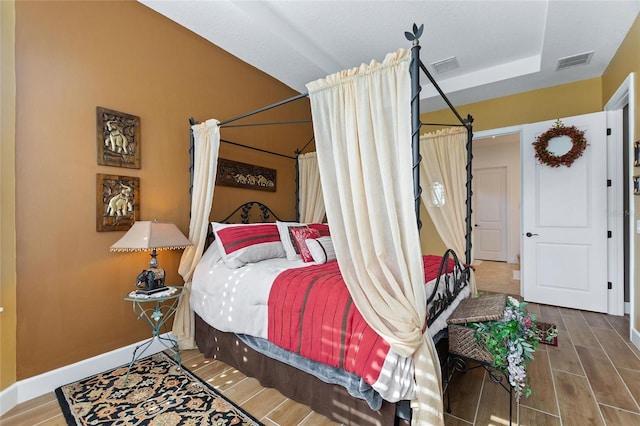 bedroom featuring hardwood / wood-style flooring