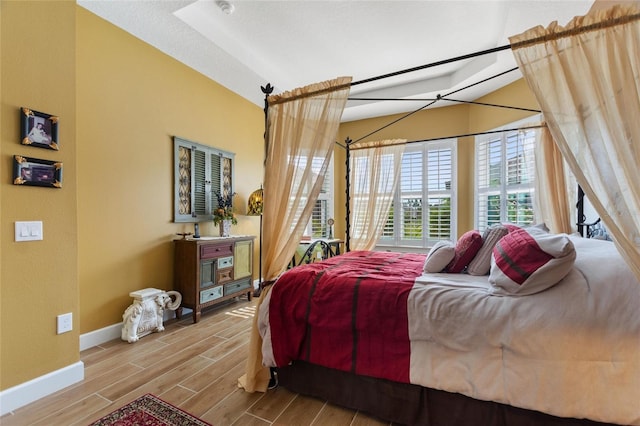 bedroom with light hardwood / wood-style flooring