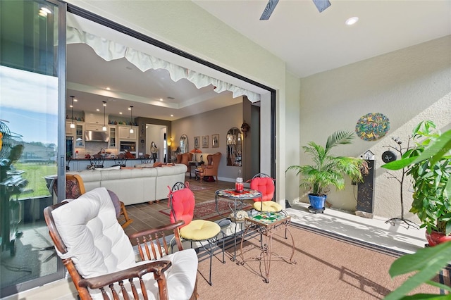 living room with ceiling fan