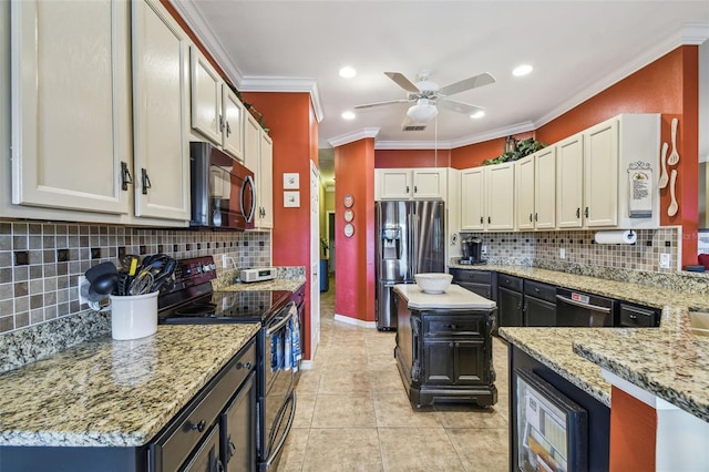 kitchen featuring light stone countertops, appliances with stainless steel finishes, decorative backsplash, ornamental molding, and light tile patterned flooring