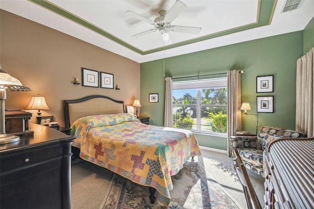 carpeted bedroom featuring ceiling fan