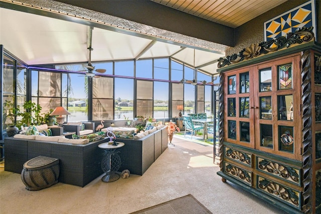 sunroom / solarium with wooden ceiling, a water view, and lofted ceiling with beams