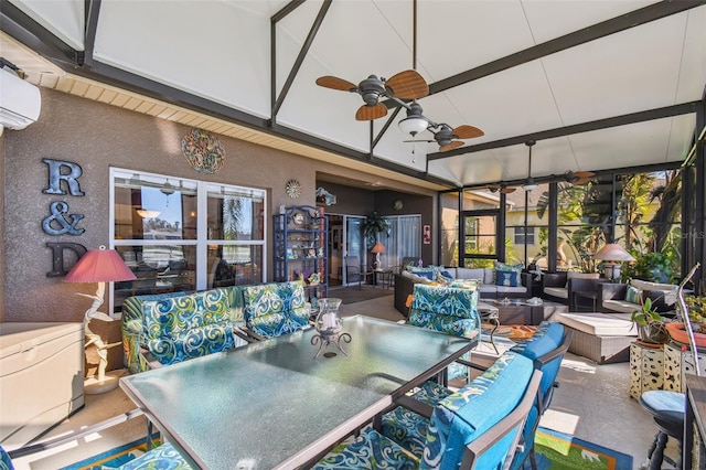 sunroom / solarium with beamed ceiling, a wall mounted AC, and a healthy amount of sunlight